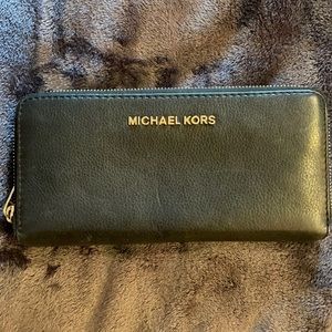 Michael Kors black leather wallet with gold accent